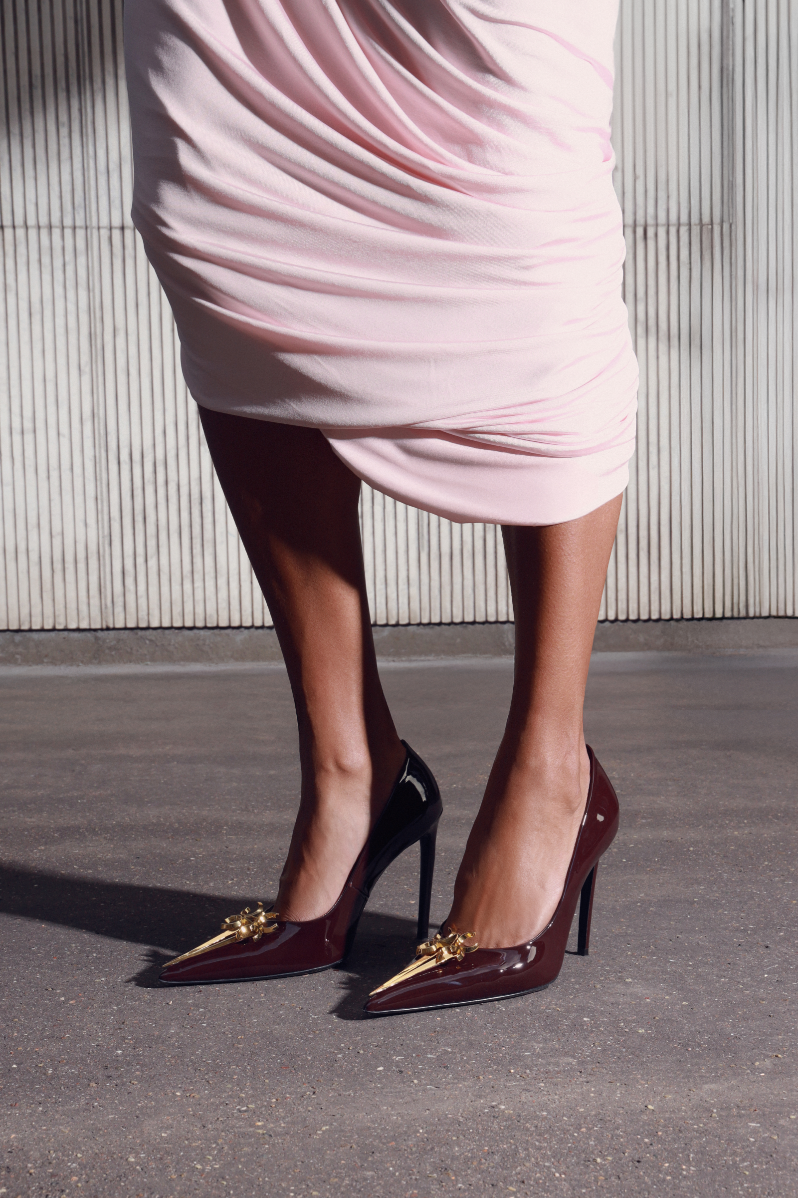 Woman wearing burgundy high heels